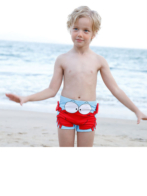 Boys wearing 2024 bathing suits