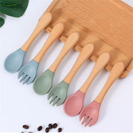 Buy Wholesale China Silicone Baby Spoon And Fork Bpa Free Kids Food  Supplement Feeding Soft Spoon With Wooden Handle & Silicone Baby Spoon And  Fork at USD 1.27