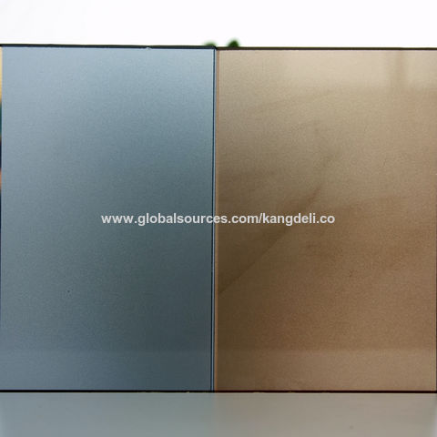 Vidrio azul gris y bronce dorado teñido con ácido grabado