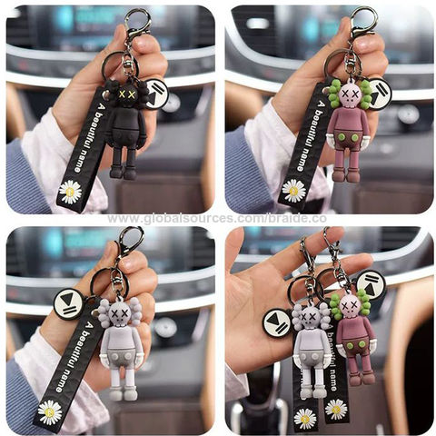 Limited new Kaws keychain  Clothes design, Keychain, Fashion design