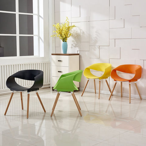 Modern plastic chair discount with wood legs