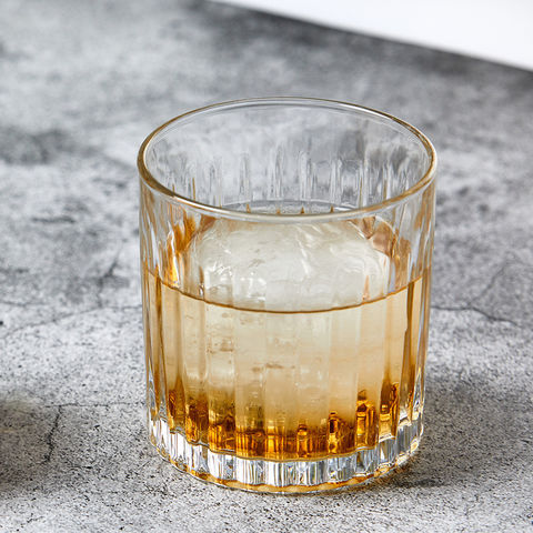 Tilted whiskey glass – VeryWhiskey