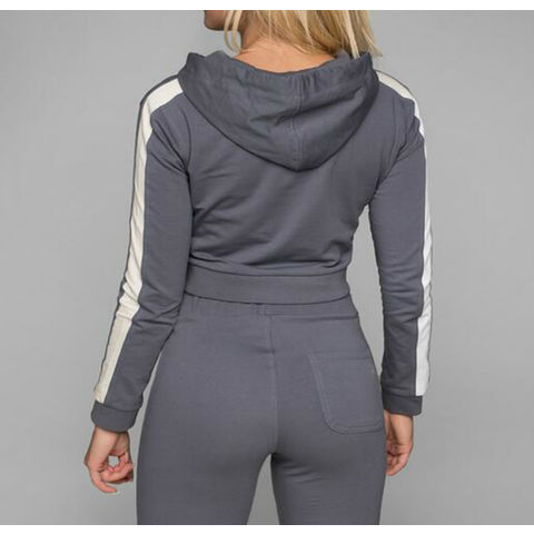 Conjunto deportivo urbano de moda con puños acanalados, sudadera con cremallera y capucha corta para mujer, ideal para yoga.