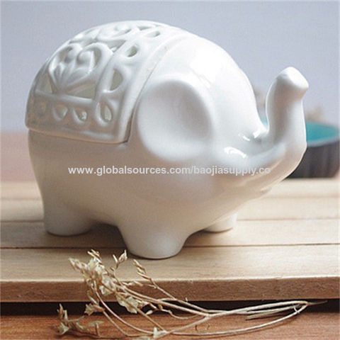 Adornos creativos para el hogar con diseño de elefante pequeño calado, candelabro de cerámica calado