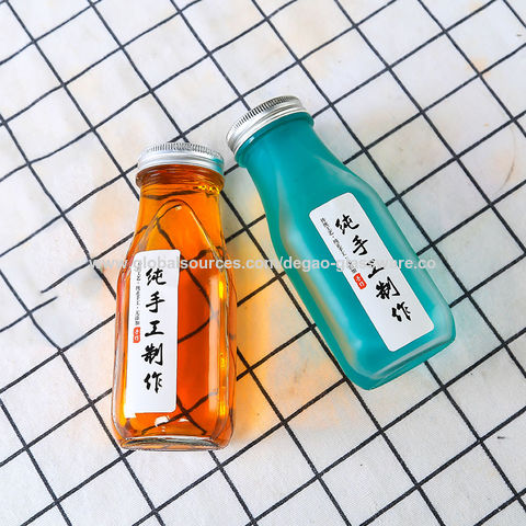 Paquete de 2 botellas de vidrio de color con tapón hermético, 33 onzas  (1000 ml), tapa