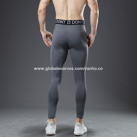Pantalones cónicos de yoga con cintura alta y bolsillo lateral