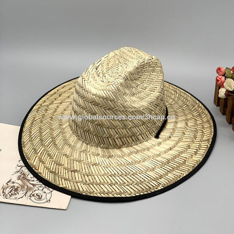 Sombrero para la playa de hombre con caprlina de paja bicolor y decoración  en tela y penca