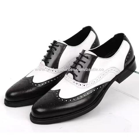 Zapatos blanco best sale y negro hombre