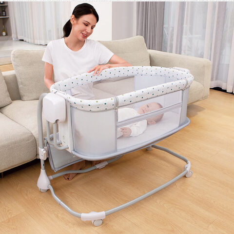 Bassinet that swings over bed online