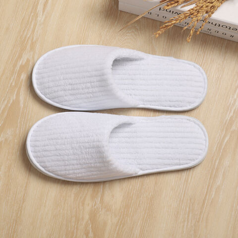 Disposable on sale slippers bulk