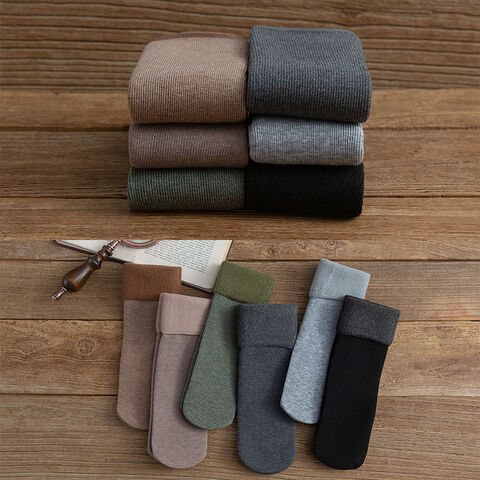 Calcetines de nieve térmicos de tubo largo de invierno y calcetines de nieve de moda de terciopelo grueso para hombres y mujeres