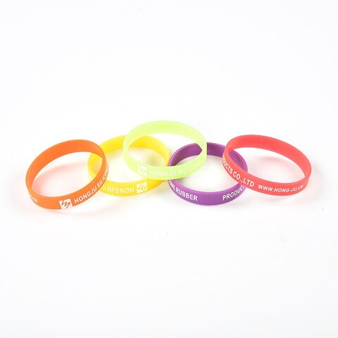 Bracelets en silicone imprimés en sérigraphie, en creux et en relief. Bracelets en silicone imprimés colorés.