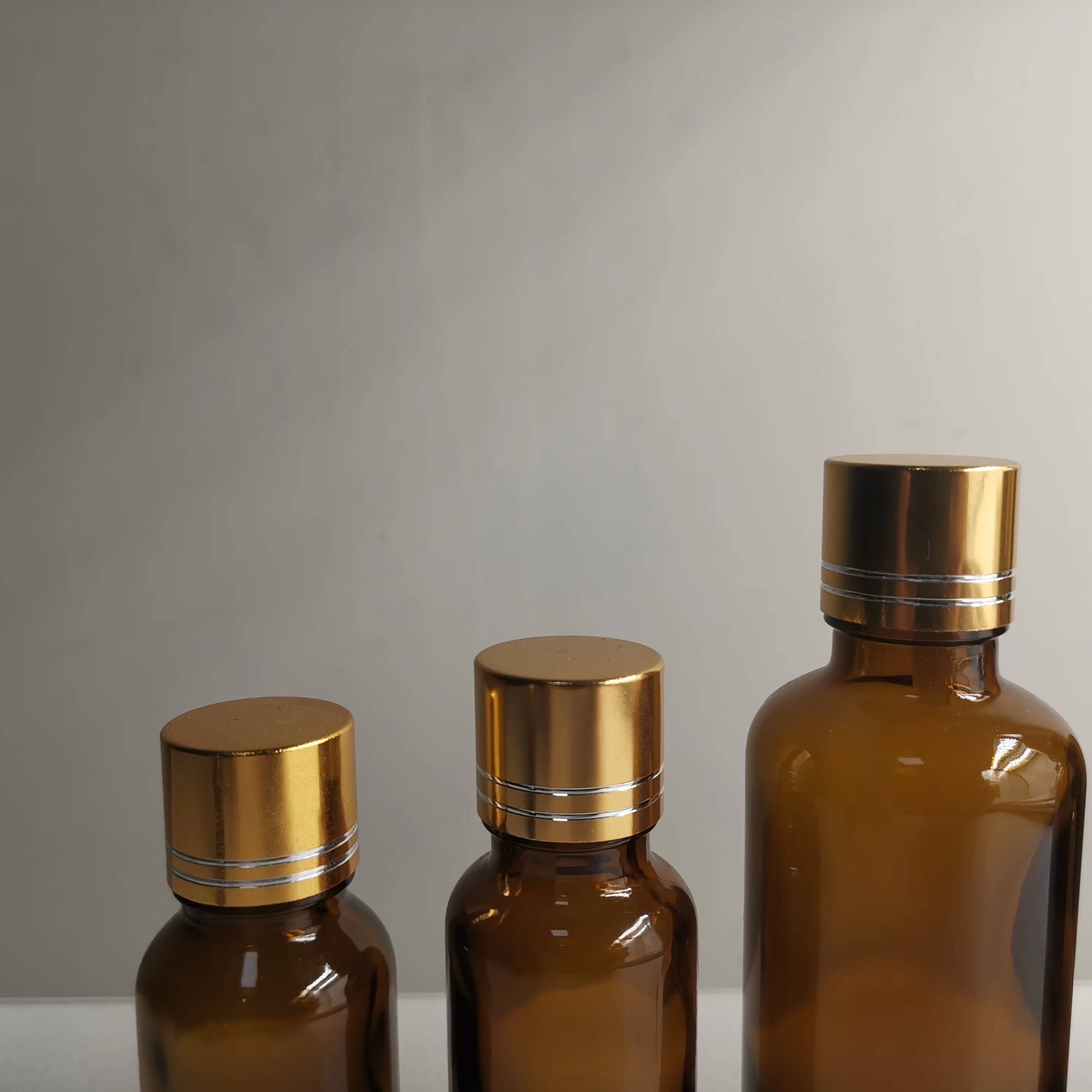 Manufacturer's Glass Bottle Direct Selling Essential Oil Bottle With Gold Lid