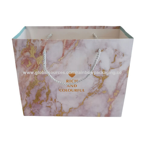 Sac de shopping en papier bleu de luxe avec logo de marque personnalisé pour l'emballage de vêtements, sac cadeau