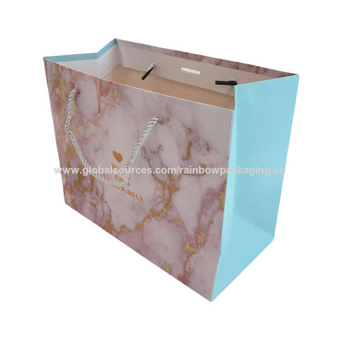 Sac de shopping en papier bleu de luxe avec logo de marque personnalisé pour l'emballage de vêtements, sac cadeau