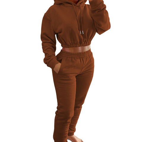 WOO Venta al por mayor Último diseño Conjunto de chándal para mujer de dos piezas, top de manga larga y pantalones deportivos holgados lisos