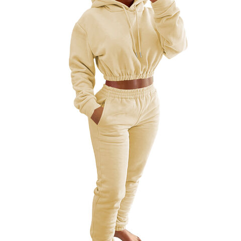 WOO Venta al por mayor Último diseño Conjunto de chándal para mujer de dos piezas, top de manga larga y pantalones deportivos holgados lisos
