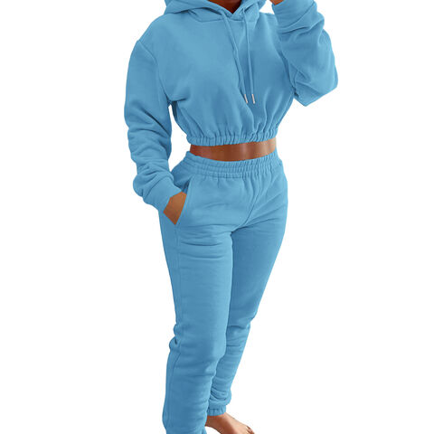 WOO Venta al por mayor Último diseño Conjunto de chándal para mujer de dos piezas, top de manga larga y pantalones deportivos holgados lisos
