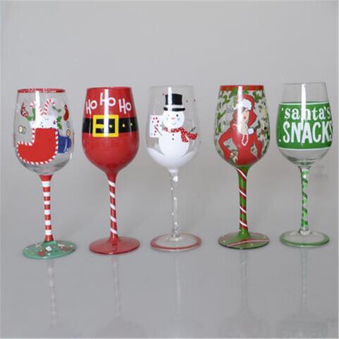 Glasbecher mit Weihnachtshaus- und Hirschmotiv