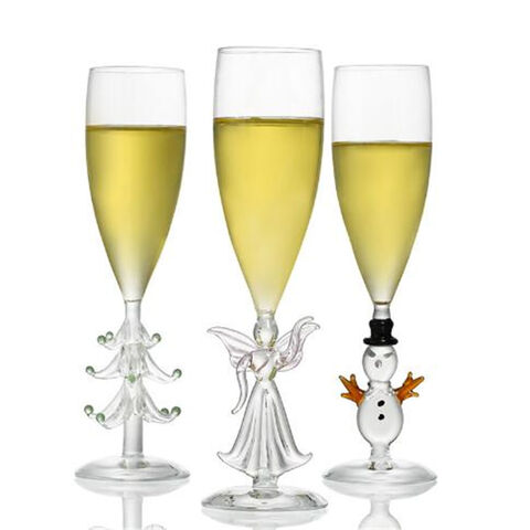 Glasbecher mit Weihnachtshaus- und Hirschmotiv