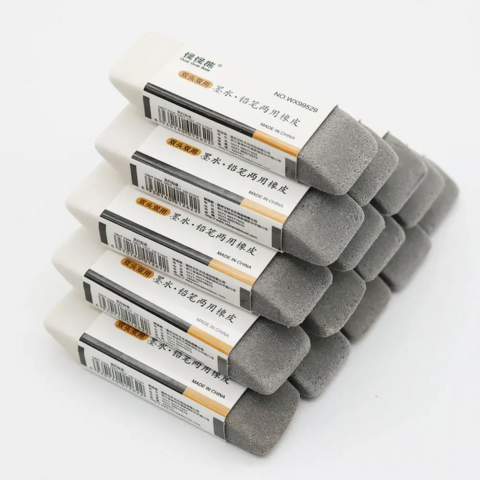 Goma de borrar pequeña, tipo lápiz, para frotar. Borrador promocional de fábrica para material de oficina y escolar.