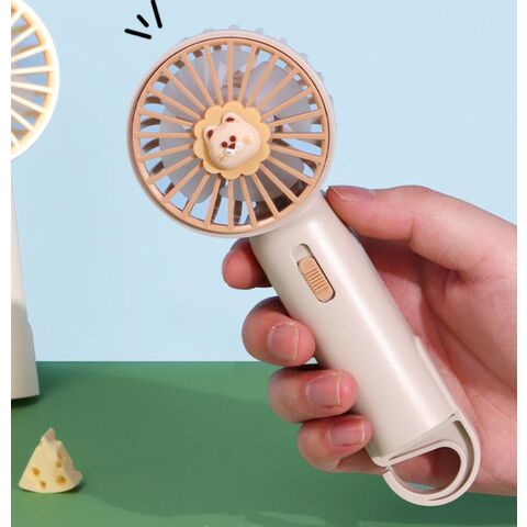 Niedlicher, kompakter, aufladbarer Handventilator im Cartoon-Stil, USB