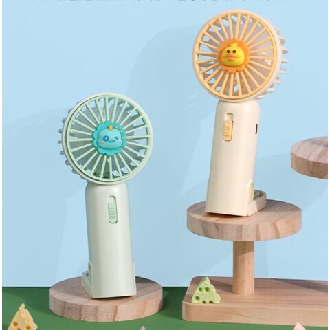 Niedlicher, kompakter, aufladbarer Handventilator im Cartoon-Stil, USB