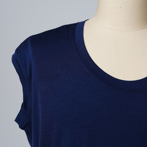 T-shirt en laine mérinos pour femme OEM 18.5MIC 85% en gros, conception sans manches respirante avec style de couleur unie pour l'été