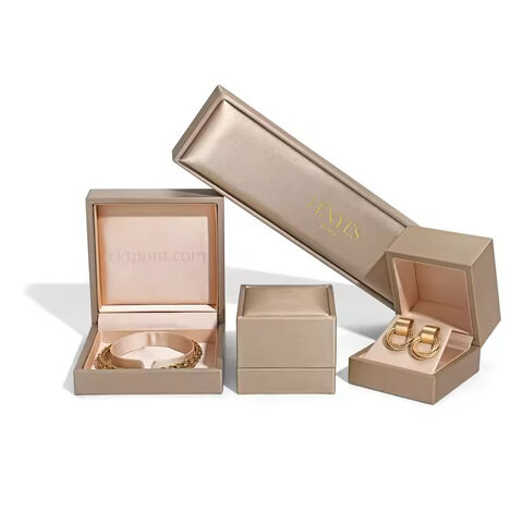 Cajas personalizadas para embalaje de joyas en oro champán para pulseras y pendientes de aro - Productos personalizados