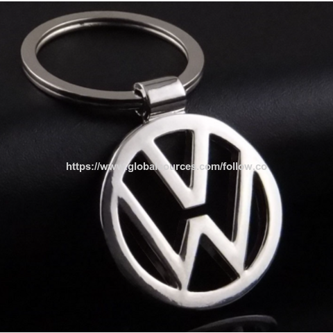 Collar metálico para campeones con piedras azules, colgantes y dijes de níquel.