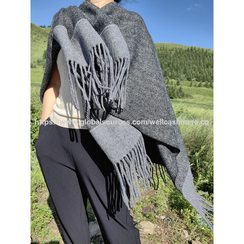 Damenmode Fischgräten-Webponcho mit besonderen Quasten - Damenmode im Großhandel
