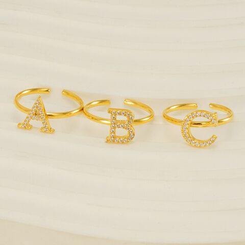 Anillos de acero inoxidable al por mayor para mujer con circonita AAA, 26 letras inglesas, apertura ajustable, joyería de moda, precio de fábrica