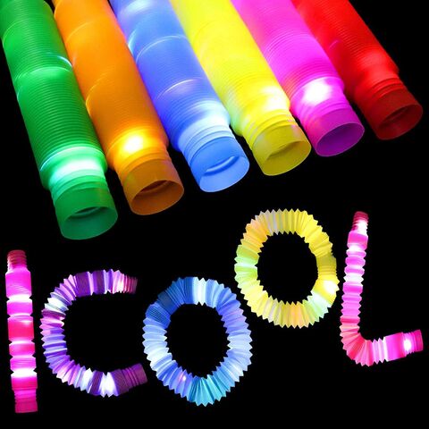 Hot sale BPA Free Plastic Light up Pop Tube Toys Glow Sticks LED Party Magic Pop Tube Sensory Toys Stretchable Pops Tubes