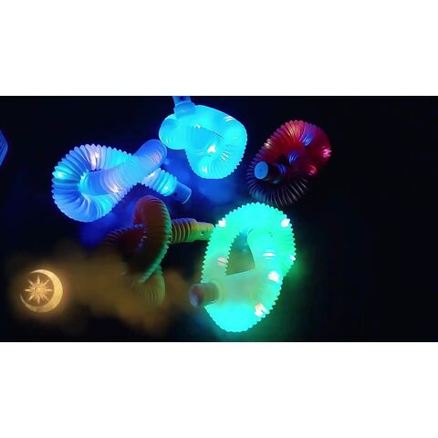 Hot sale BPA Free Plastic Light up Pop Tube Toys Glow Sticks LED Party Magic Pop Tube Sensory Toys Stretchable Pops Tubes