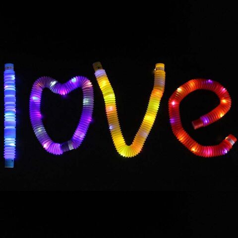 Hot sale BPA Free Plastic Light up Pop Tube Toys Glow Sticks LED Party Magic Pop Tube Sensory Toys Stretchable Pops Tubes