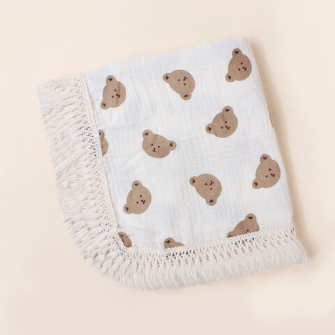 Couverture pour enfants en gros, double épaisseur, pliante, couverture d'emmaillotage en pur coton doux avec pompons, couverture de poussette pour bébé, pour la maison