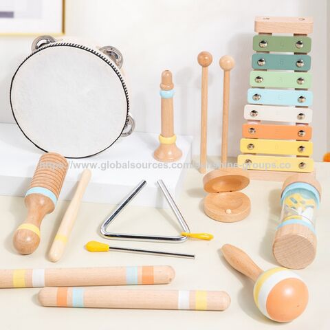 Instrumentos de percussão Orff de madeira, agitadores vocais infantis, chocalhos, tambores de mão, sinos, xilofones, brinquedos