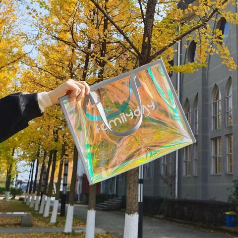 Sac fourre-tout holographique en plastique en gros avec poignée en cuir Sac holographique en PVC Sac à main tendance en PVC