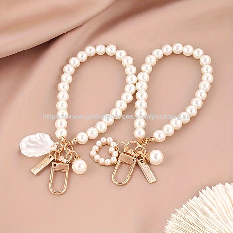Llavero con colgante de pulsera de amor creativo 2025, accesorios de perlas al por mayor