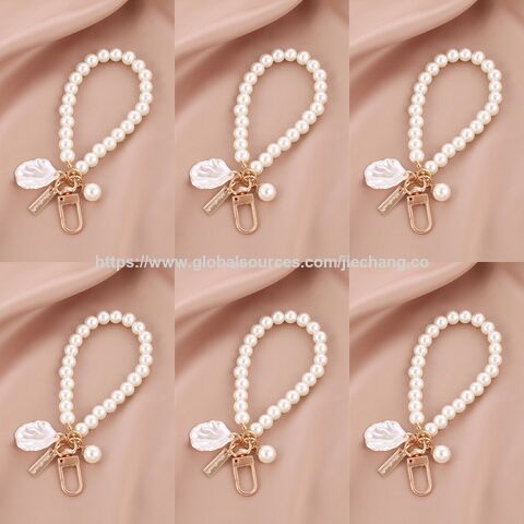 Llavero con colgante de pulsera de amor creativo 2025, accesorios de perlas al por mayor