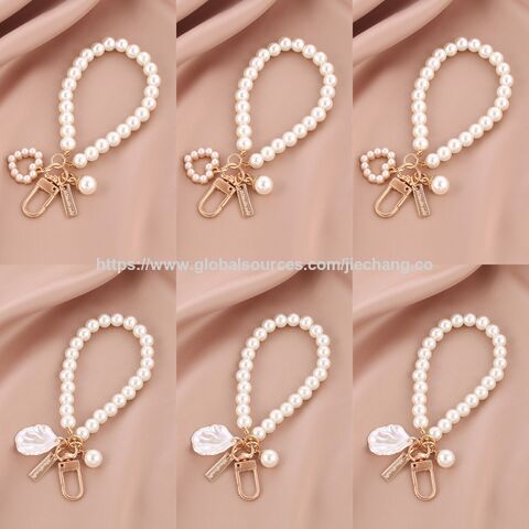 Llavero con colgante de pulsera de amor creativo 2025, accesorios de perlas al por mayor