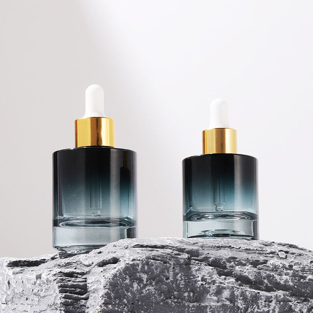 Frasco gotero de vidrio de lujo de 30 ml con nuevo diseño para aceite esencial, envase para suero para el cuidado de la piel con gotero dorado metálico