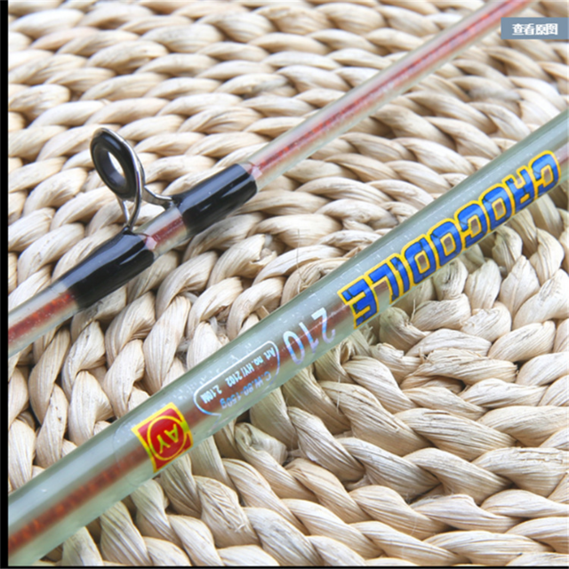 Caña de spinning para agua salada de fibra de vidrio con empuñadura de espuma Eva sólida de dos piezas al por mayor - Tienda mayorista precio de fábrica transparente