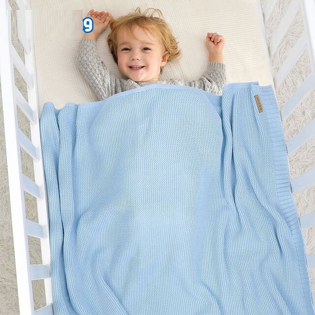 Manta para bebé de algodón 100% de color sólido a precio de mayorista OEKO-TEX de venta caliente, manta tejida a rayas para recién nacidos