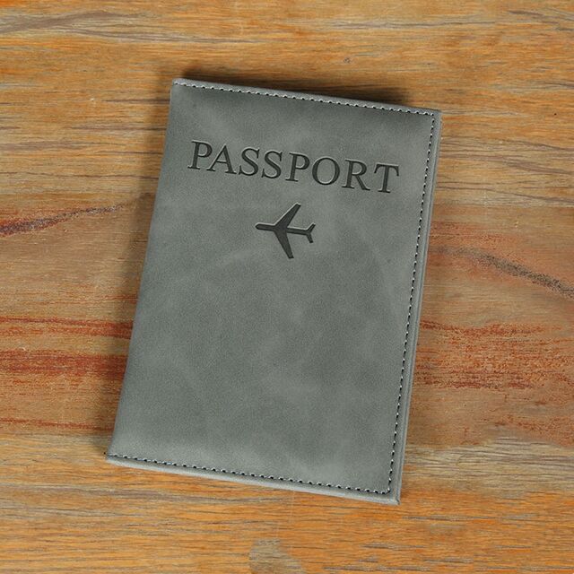 Nouvelle couverture de protection de passeport populaire, clip de passeport en PU, clip de billet en stock, vente en gros, couverture de protection simple et à la mode