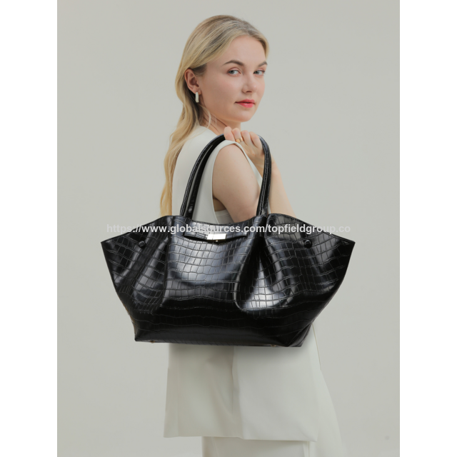 Bolsos de hombro grandes de gran capacidad más vendidos, bolsos de mano con alas de murciélago, bolsos de mano de cuero PU retro de alta gama para mujer
