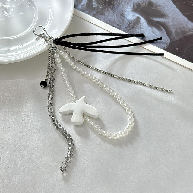 Al por mayor Nuevo Colgante Llavero de Moda Versátil en Forma de Corazón y Pájaro con Perla Artificial, Cristal y Piedra CCB para Decoración de Bolsos y Llaves