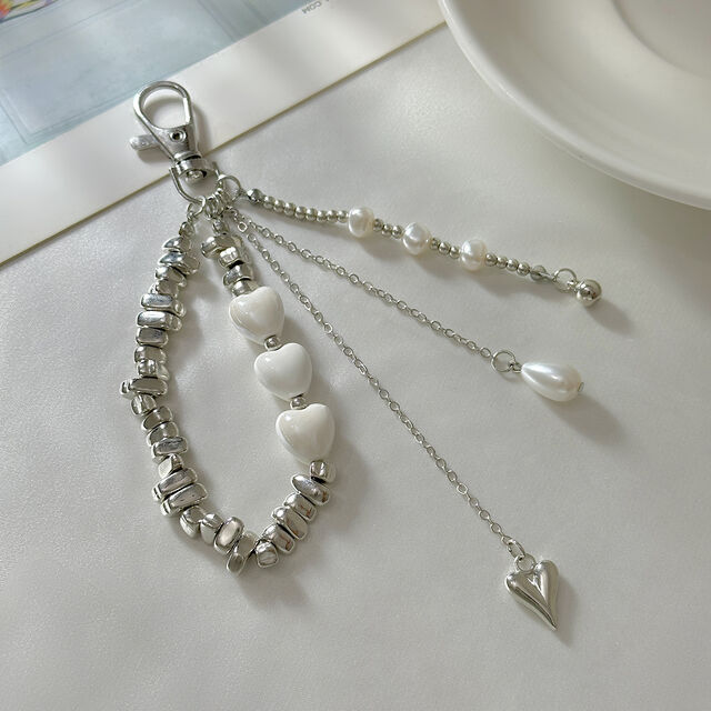 Al por mayor Nuevo Colgante Llavero de Moda Versátil en Forma de Corazón y Pájaro con Perla Artificial, Cristal y Piedra CCB para Decoración de Bolsos y Llaves