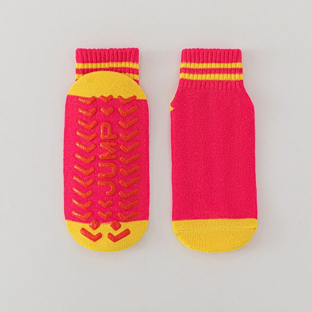 Vente en gros de chaussettes antidérapantes pour enfants, chaussettes pour aire de jeux, mi-mollet, double barre, blocs de couleur, trampoline, personnalisables