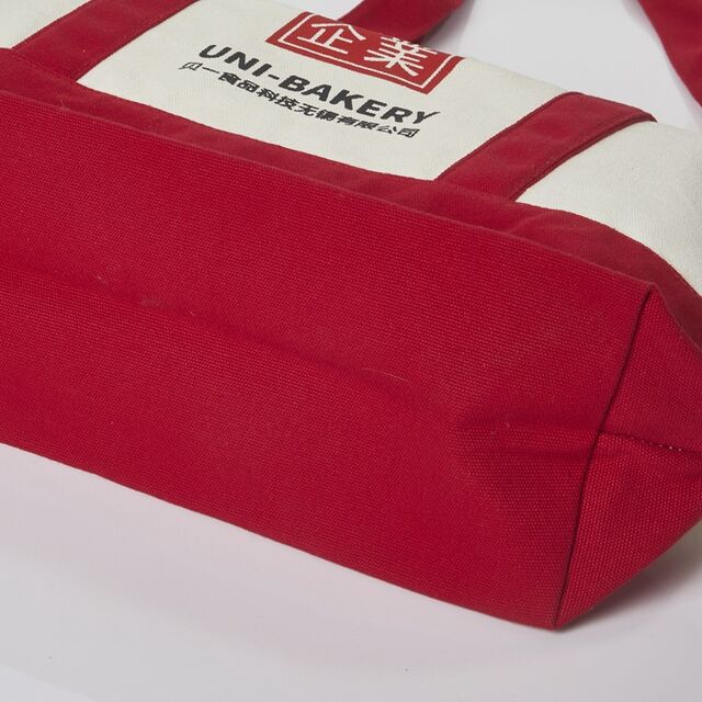 Canvas tote bag with built-in logo, printed in color by digital sublimation, for hand carrying.